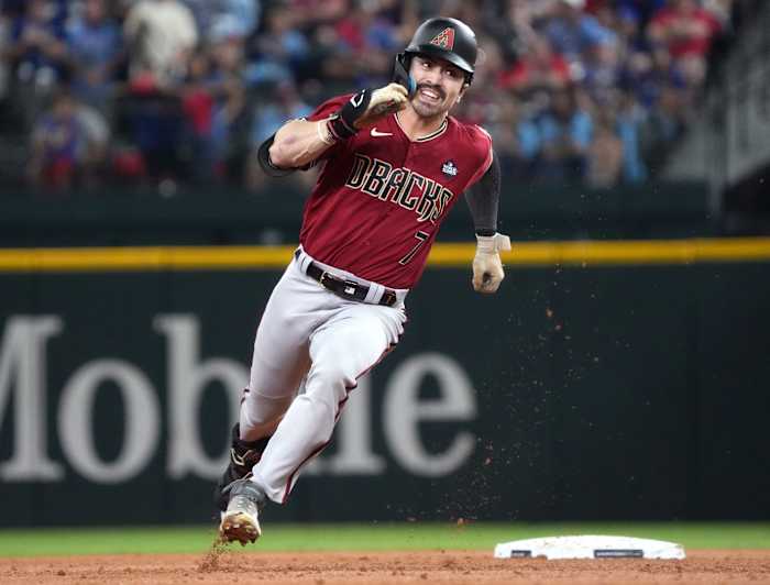 Oct 27, 2023; Arlington, Texas, USA; Arizona Diamondbacks outfielder Corbin Carroll (7) rounds second base against the Texas Rangers during Game 1 of the World Series at Globe Life Field.